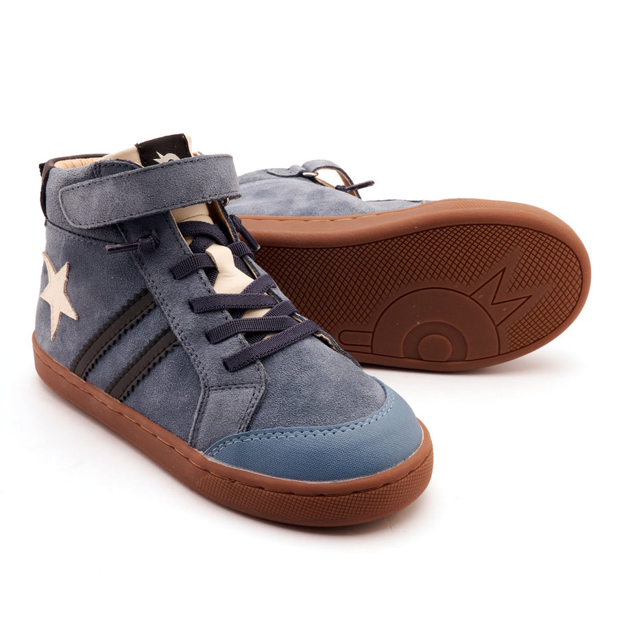 Blue high-top sneakers with brown soles on a white background