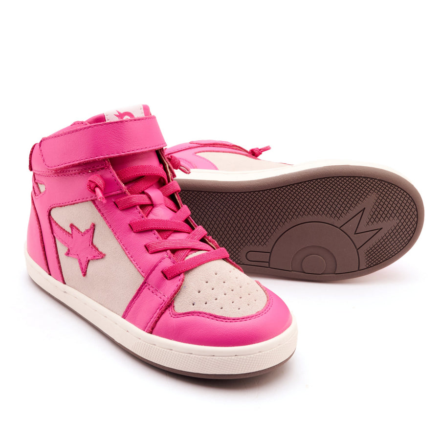 Pink high-top sneakers with star design on a white background